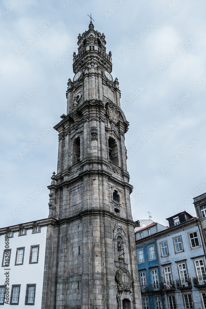 The Baroque Church of Clerigos (Igreja dos Clerigos, architect Nicolau Nasoni, 1763), which is attached to the iconic Clerigos Tower, one of the landmarks and symbols of the city of Porto. Portugal. The Baroque Church of Clerigos (Igreja dos Clerigos, architect Nicolau Nasoni, 1763), which is attached to the iconic Clerigos Tower, one of the landmarks and symbols of the city of Porto. Portugal.