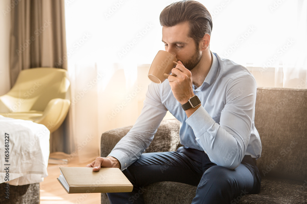 Young man business traveler hotel room accomodation Young man business traveler hotel room accomodation
