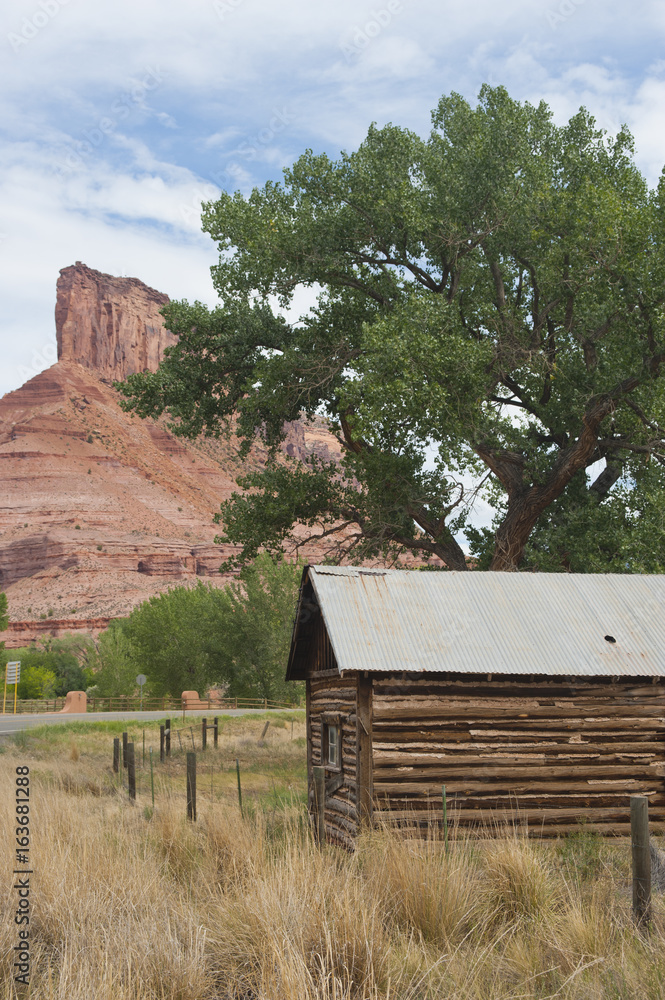 Log Cabin and The Palisade Butte Log Cabin and The Palisade Butte