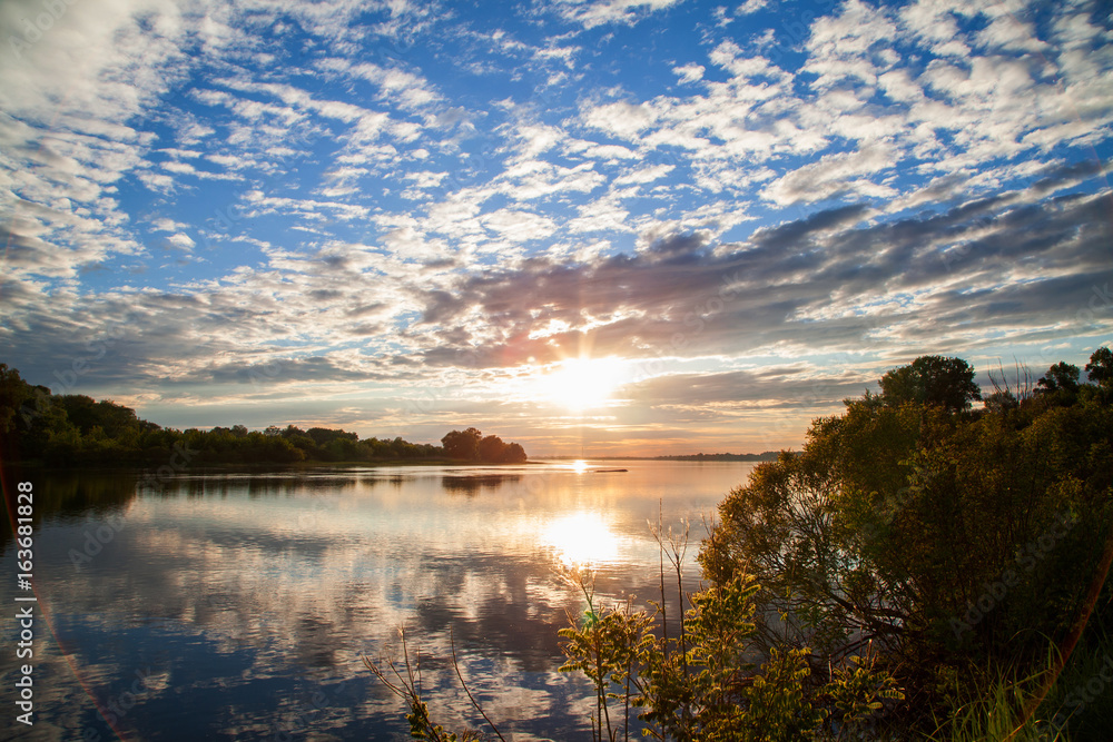 Nature of Ukraine. A beautiful sunset on the Dnieper river flood. Landscapes of Ukraine. Poltava region.