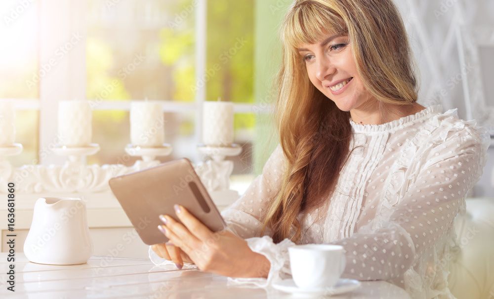Young woman using digital tablet Young woman using digital tablet