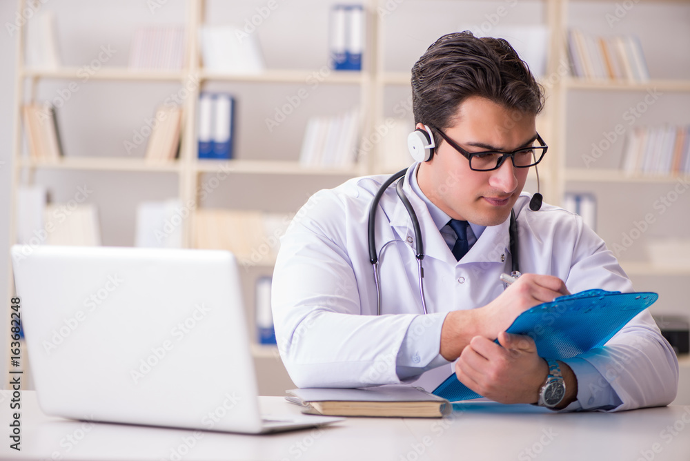 Young man doctor in medical concept Young man doctor in medical concept
