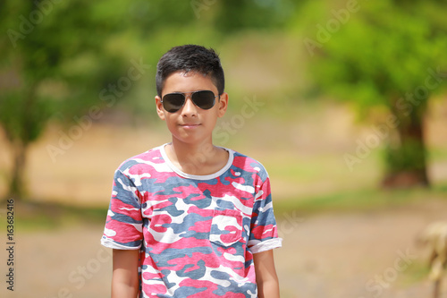 indian child on eyeglass