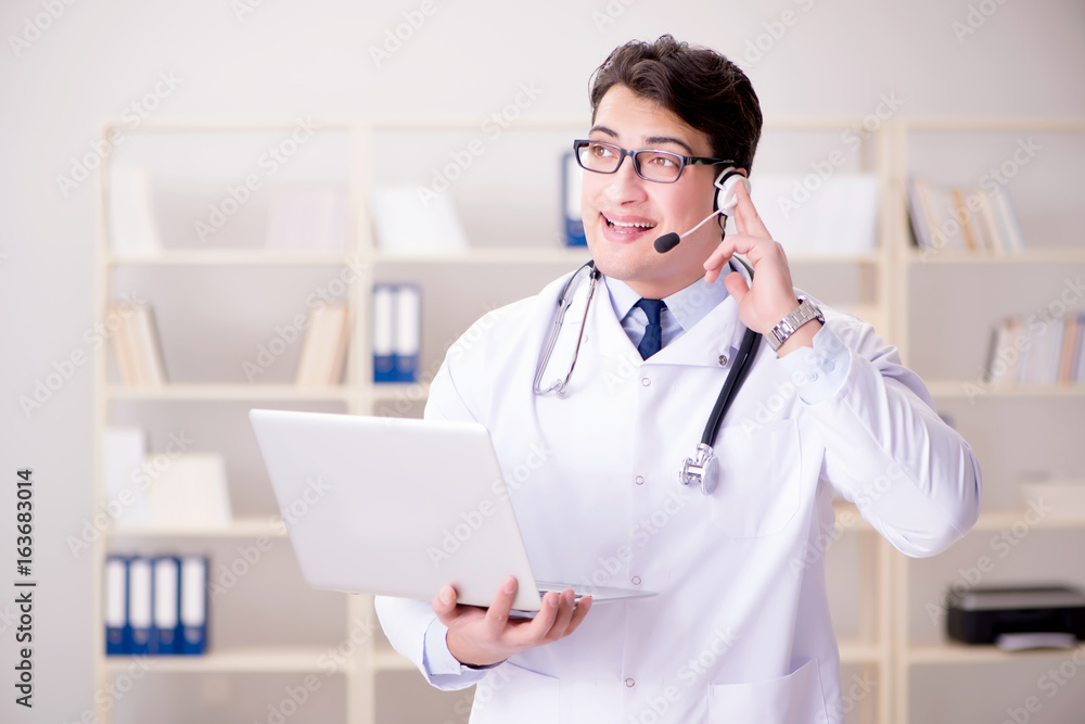 Young man doctor in medical concept Young man doctor in medical concept