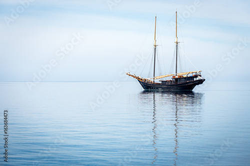 Sailing boat on the ocean.