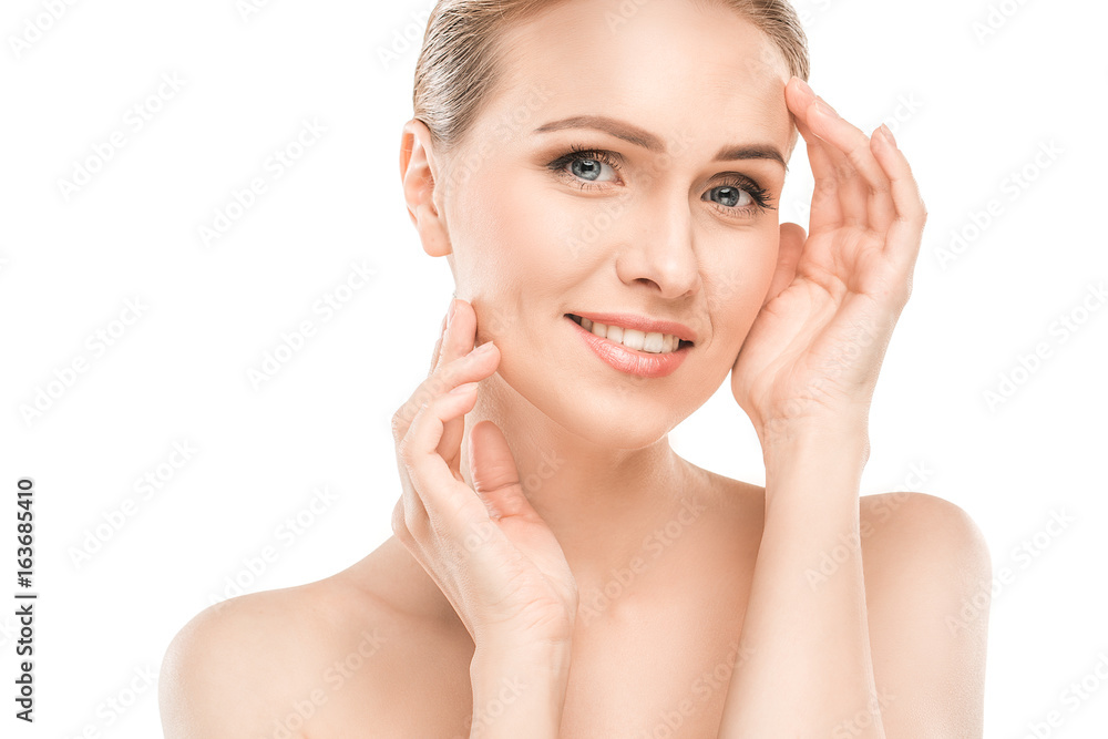 Mature woman beauty health care isolated on white Mature woman beauty health care isolated on white