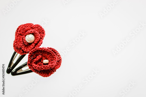 hair clips made from yarn on white background