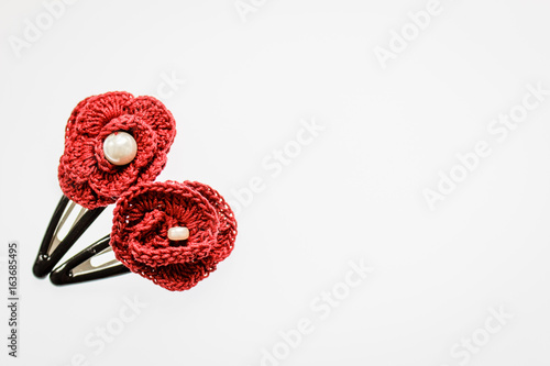hair clips made from yarn on white background
