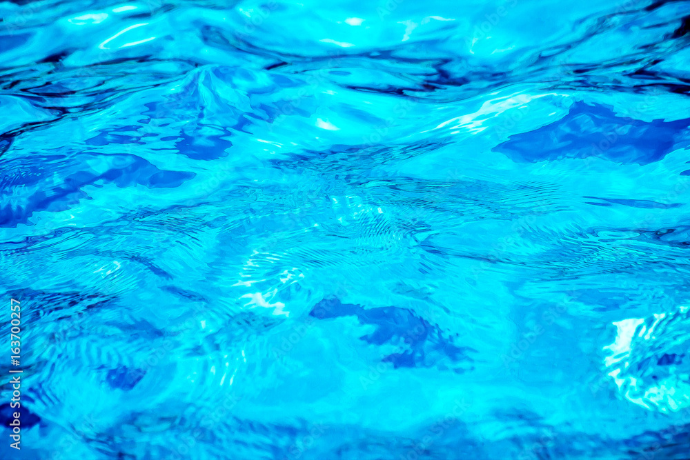 Surface of the pool water as a background