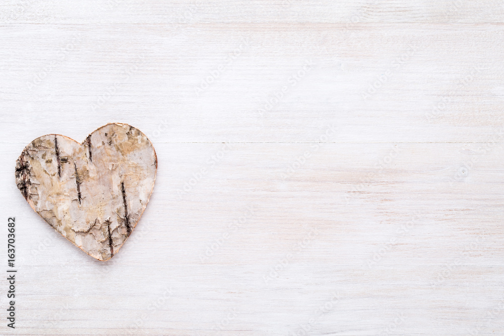 Background with wooden hearts, place for text.