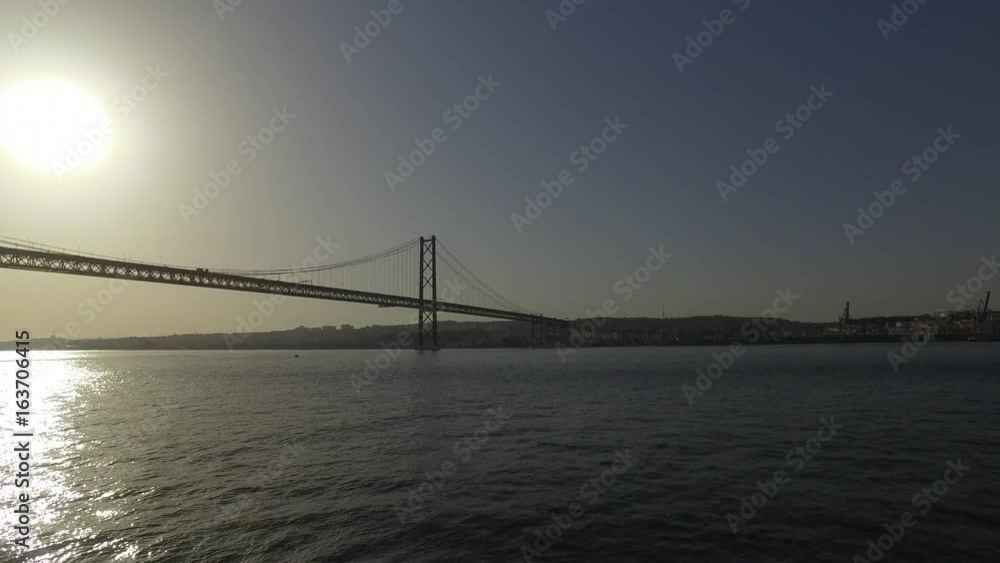 Famous 25th April Bridge over River Tajo in Lisbon aka Salazar Bridge Famous 25th April Bridge over River Tajo in Lisbon aka Salazar Bridge