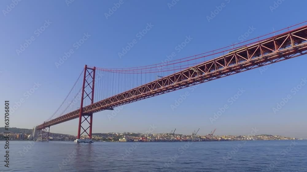 Famous 25th April Bridge over River Tajo in Lisbon aka Salazar Bridge Famous 25th April Bridge over River Tajo in Lisbon aka Salazar Bridge