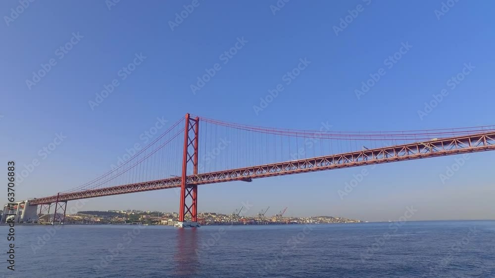 Famous 25th April Bridge over River Tajo in Lisbon aka Salazar Bridge Famous 25th April Bridge over River Tajo in Lisbon aka Salazar Bridge