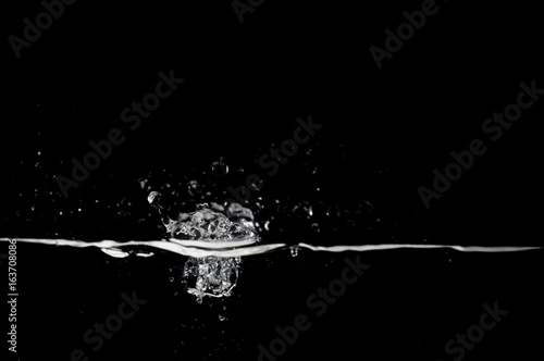 Water drop on a black background