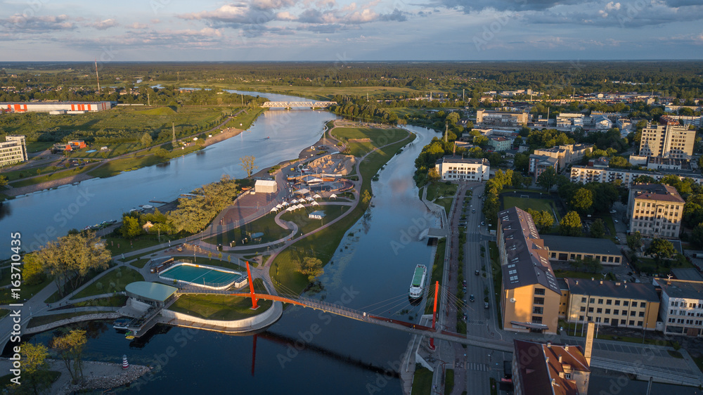 Pedestrian cable-stayed bridge in Jelgava. Aerial view from drone.