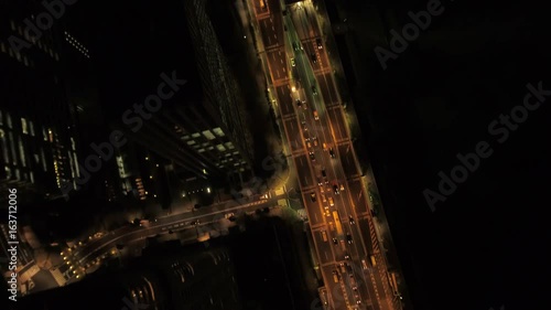 Japan Tokyo Aerial v51 Vertical view flying low over highway at night photo