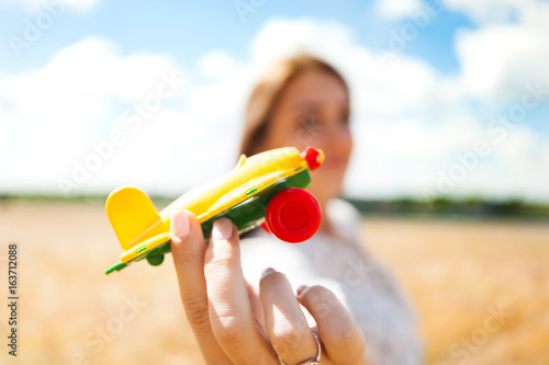 Beautiful girl in the field photo