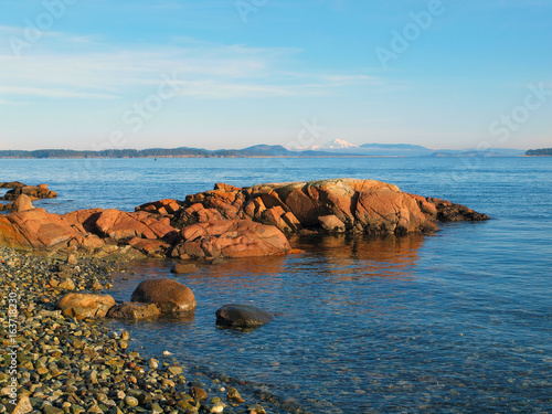 View on Mt. Baker from the rocky beach on Vancouver Island, Canada