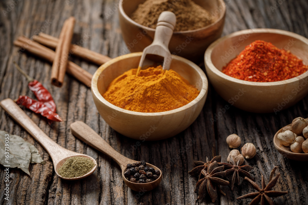 Herbs and spices on the wooden table