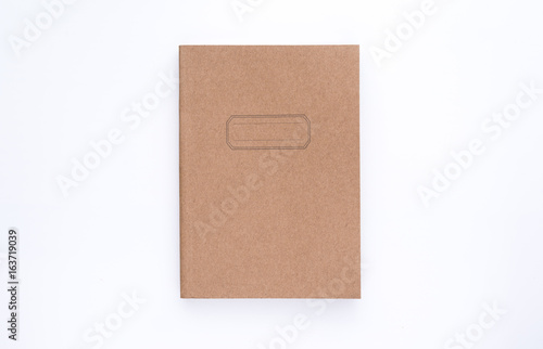 brown notebook  on white isolated background © t.paisit