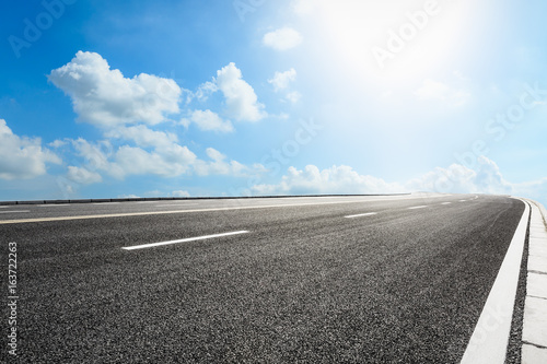 Wallpaper Mural Asphalt road and blue sky Torontodigital.ca