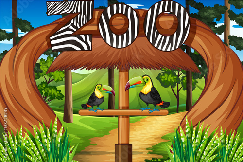 Zoo entrance with two toucan birds © blueringmedia