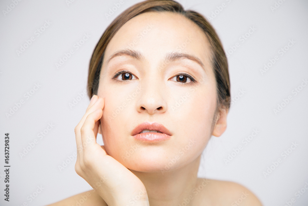 beauty woman who checks her skin, skin care, acne treatment