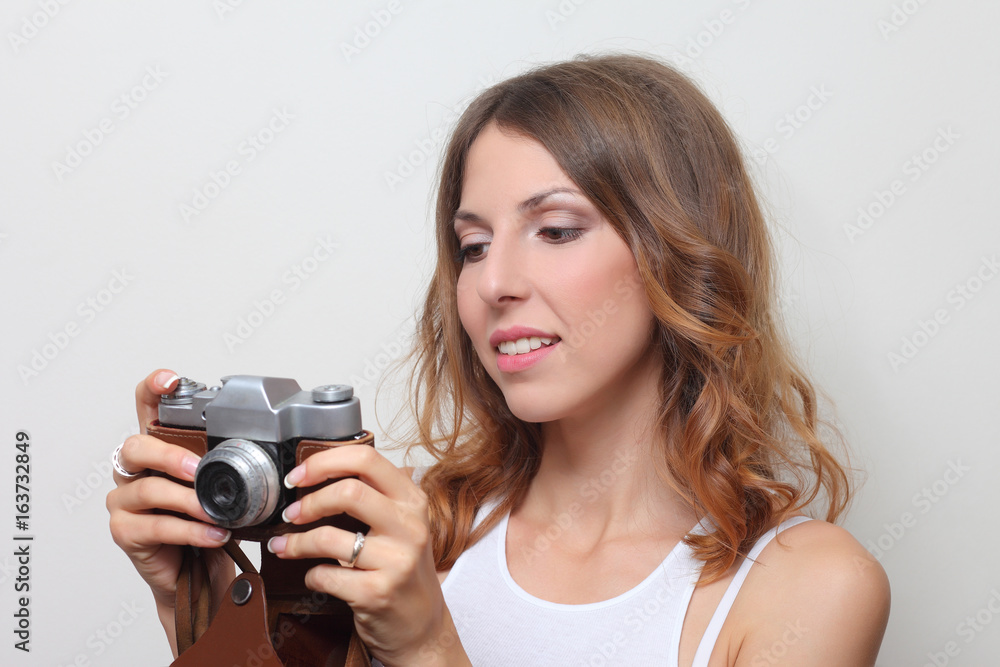 photographer holding a film camera in hands photographer holding a film camera in hands