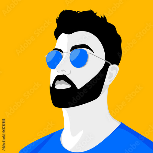 Handsome young man wearing sunglasses