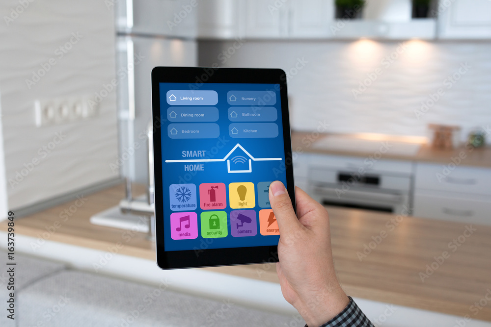 man hand holding tablet app smart home background room kitchen man hand holding tablet app smart home background room kitchen