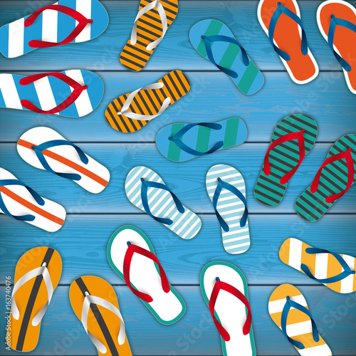Colored Flip-Flops Wooden Background
