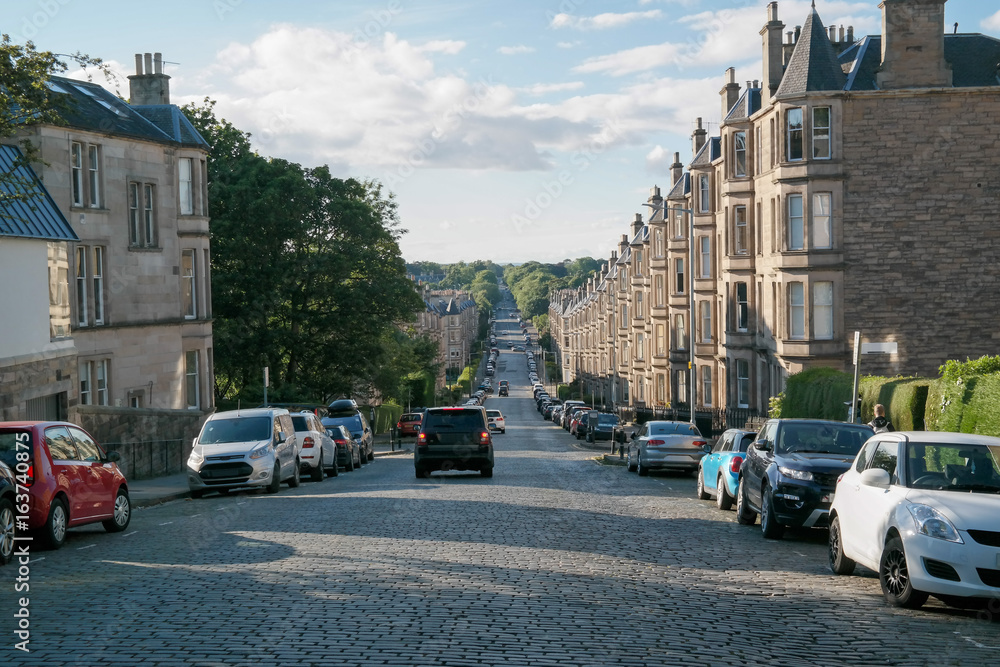 Hilly road with cars in Edinburgh Scotland