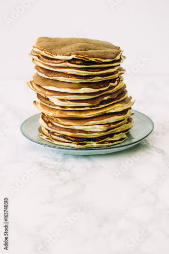 Delicious pancakes on white background. Morning and breakfast concept