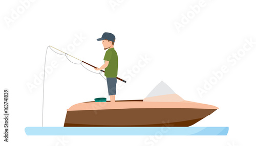 Fisherman is fishing standing with fishing rod in boat.