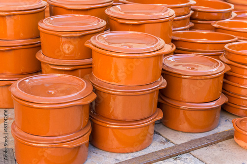 Traditional spanish cooking pots at the tourist market of Valencia