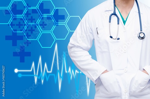 smart doctor with a stethoscope around his neck on blue color tone background with heartbeat line, cross and hexagon shaped pattern background, health care and medical technology concept, copy space