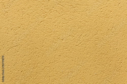Wallpaper Mural Yellow ochre painted stucco wall. Background texture. Torontodigital.ca