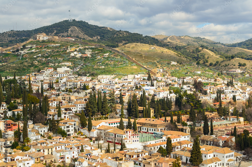 Fototapeta premium Panoramic view of Granada city against mountains, Andalusia, Spain