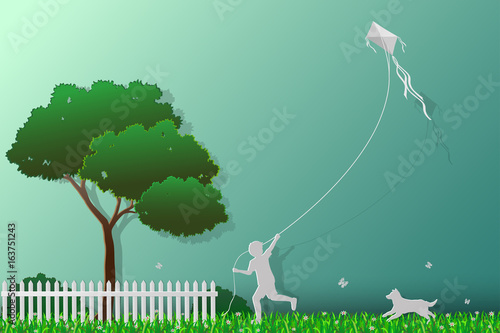 Concept of love the earth,save the environment and nature,happy child playing kite in the meadow with dog,paper art style