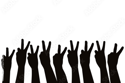 Hands showing victory sign