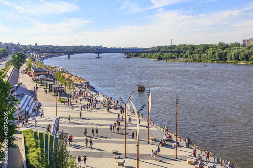 Warsaw, section of Vistula boulevards between  Swietokrzyski Bridge and  Silesian-Dabrowski Bridge. Sundey afternoon.