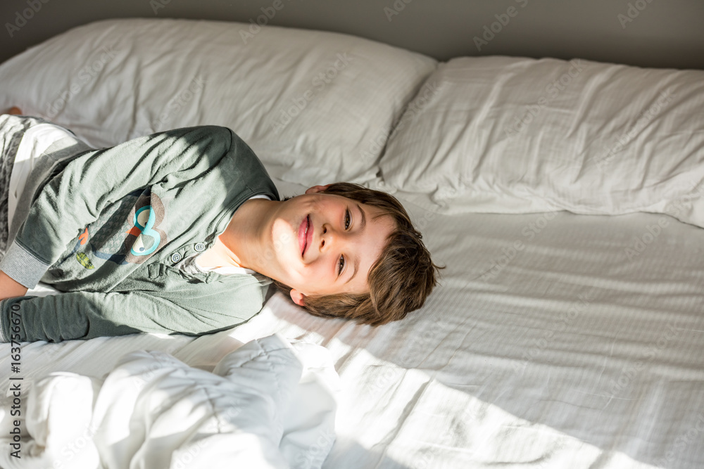 Young boy waking up Young boy waking up