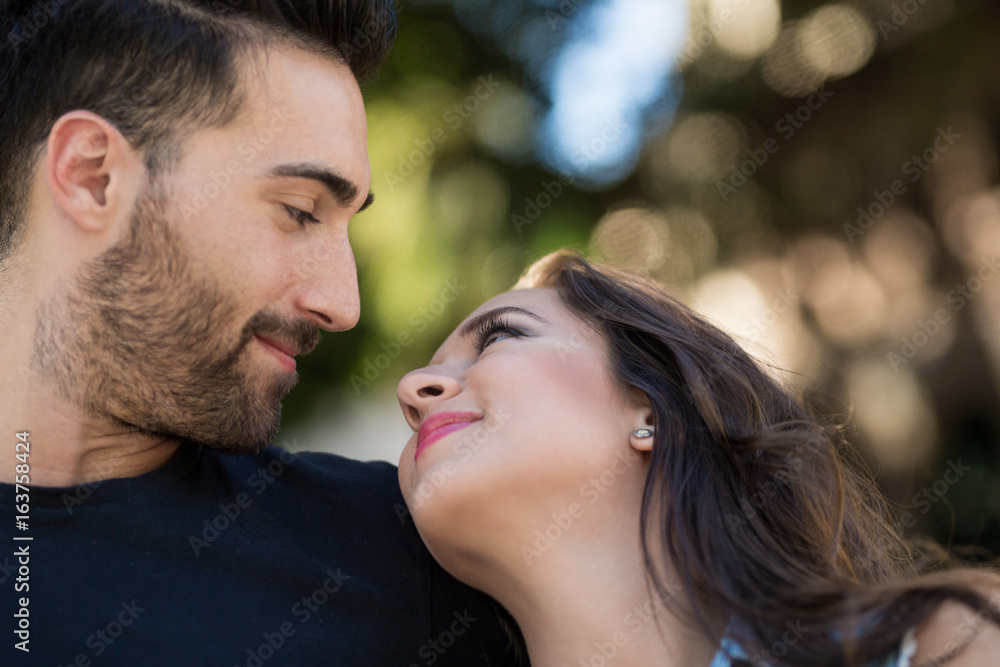Young couple looking at each other smiling Young couple looking at each other smiling