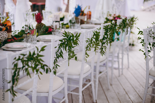 Decoration of chairs at the wedding
