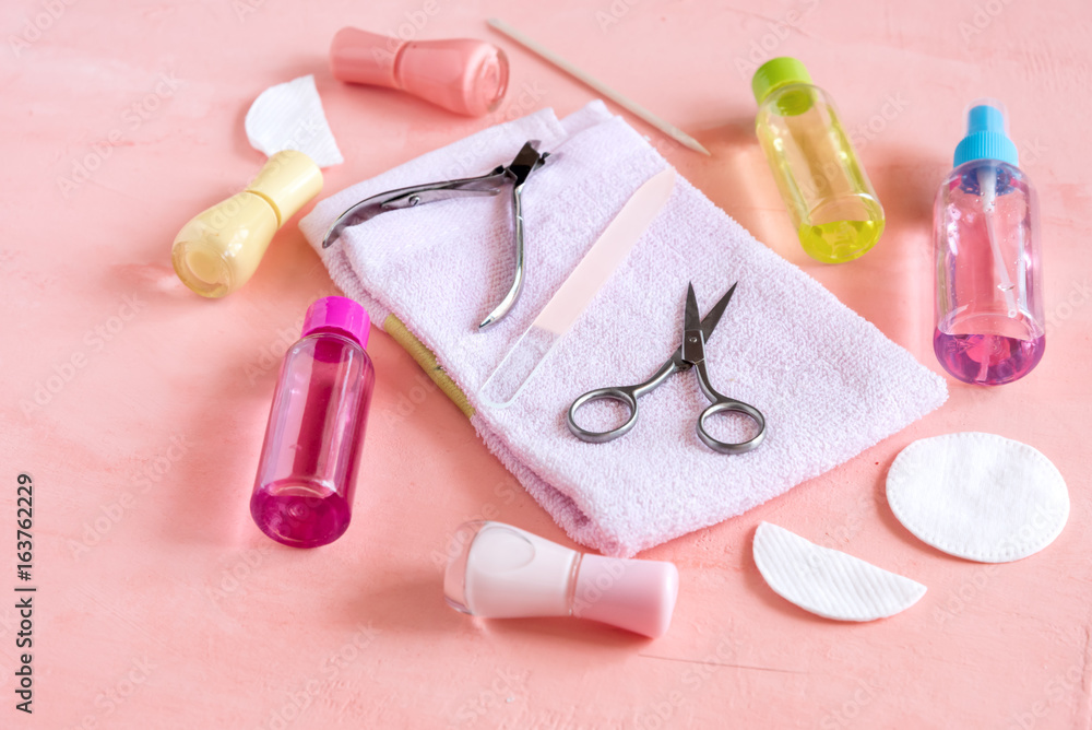Accessories for manicure or pedicure concept of nail hand and foot care copy space for text or inscription Yellow Pink and red nail Lacquer Accessories for manicure or pedicure concept of nail hand and foot care copy space for text or inscription Yellow Pink and red nail Lacquer