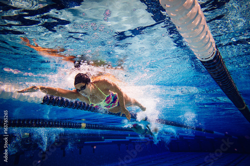 Swimmer doing freestyle in lane