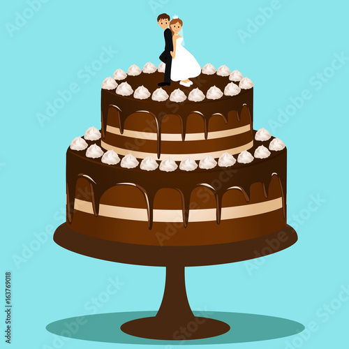 Wedding cake with bride and groom figurine.