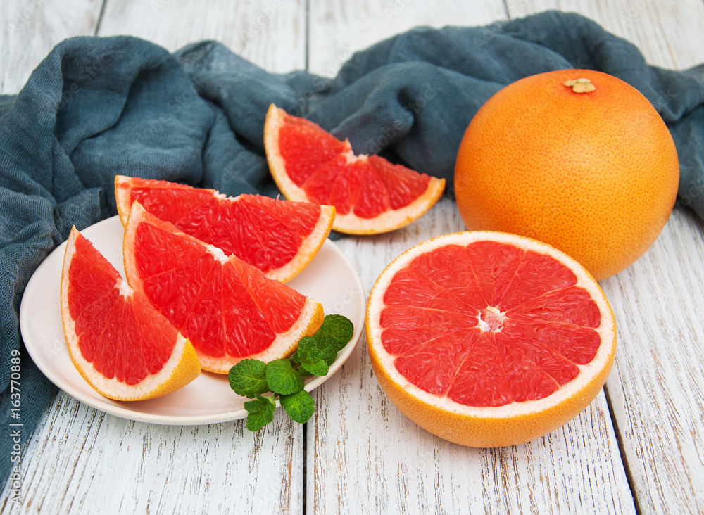 Sliced ripe grapefruits Sliced ripe grapefruits