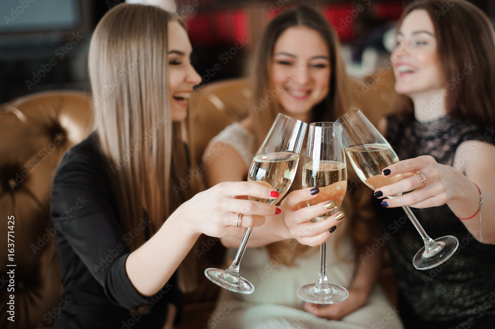 holidays, nightlife, bachelorette party and people concept - smiling women with champagne glasses holidays, nightlife, bachelorette party and people concept - smiling women with champagne glasses