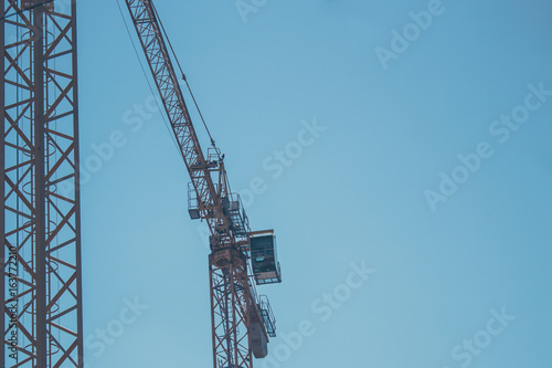Lifting crane in the sky